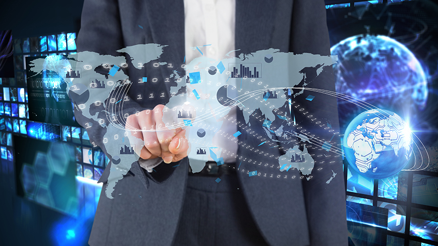 Businesswoman touching world map interface with global network connections and digital screens.