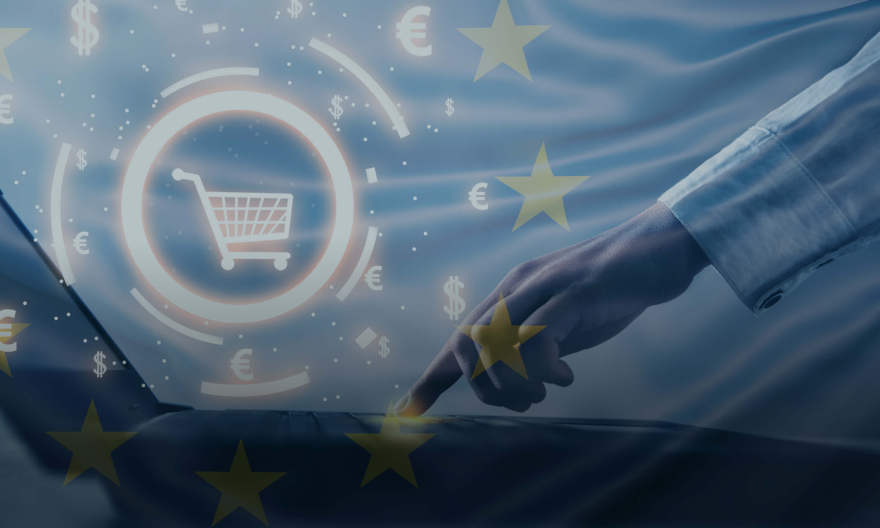 European Union online shopping concept: Hand on laptop with shopping cart icon overlay. EU flag background.